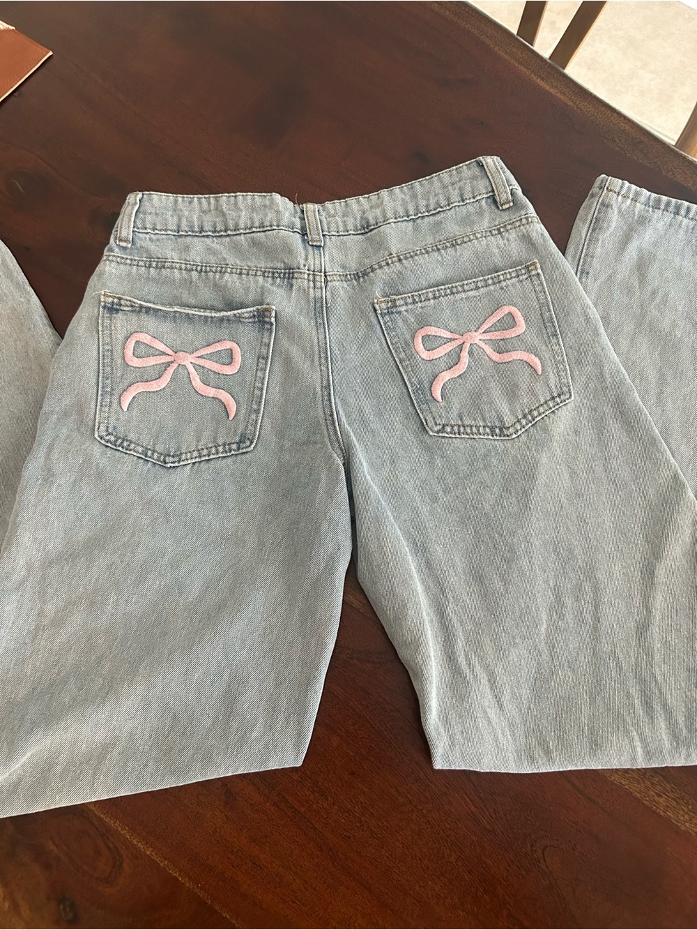 Edikted Light Wash wide Leg Jeans with Pink Bow Embroidery
